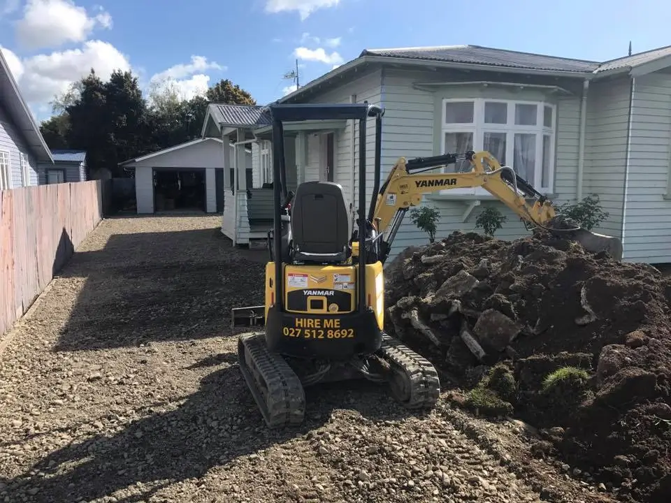 Ground being cleared and prepared for upcoming concrete work — by Manawatu Concrete.