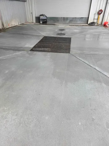 Custom concrete solution featuring integrated drainage built by Howe Civil Manawatu.